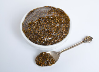 Chia seeds caviar with laminaria on white background