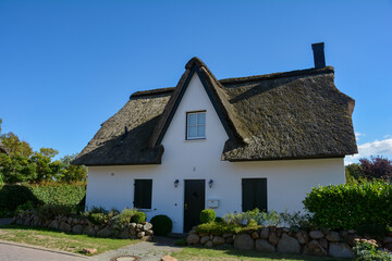 Fototapeta na wymiar House with thatched roof