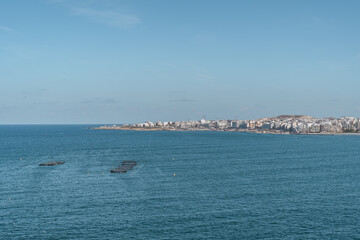 Panoramic view of Saint Paul's bay with fish farm on a sunny summer day