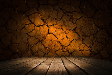 image of a wooden table on an abstract dark background with light in the center