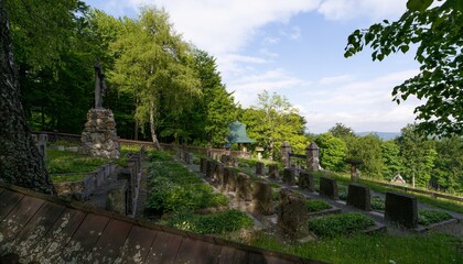 Fototapeta na wymiar Forest cemetery in spring. Hostyn. Eastern Moravia. Czechia.