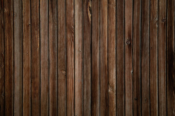 image of a wooden table on an abstract dark background with light in the center