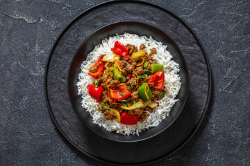 crispy ground beef with stir-fried veggies in bowl