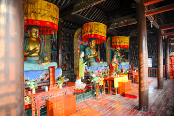 Fototapeta na wymiar Colorful Interior of ancient Zhoucun District Chinese Temple - stock photo