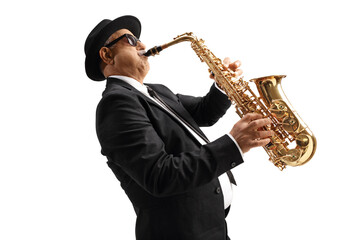 Profile shot of a mature elegant musician playing sax