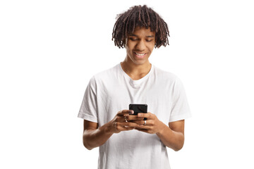 Afro american young man using a smartphone and smiling