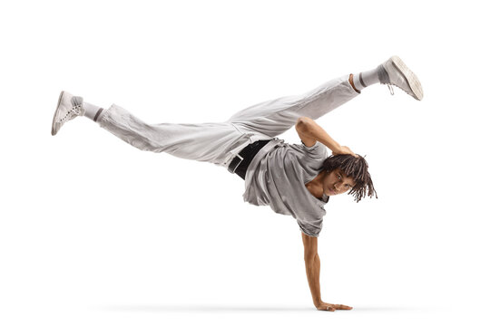 Afro american male dancer performing a handstand