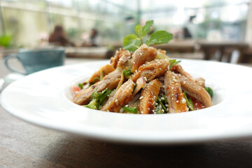 Caesar Salad in a bowl on table,