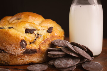 photography of homemade organic chocolate bread on the table with milk