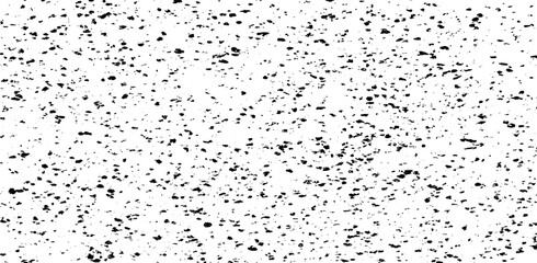 Small uneven spots and particles of debris. Abstract vector texture. Distressed uneven background. Grunge texture overlay with fine grains isolated on white background. Vector illustration. EPS10.