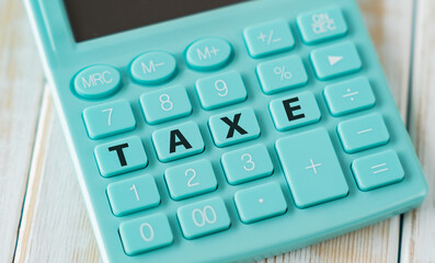 Taxe White Background Text on Calculator Buttons Business Concept.