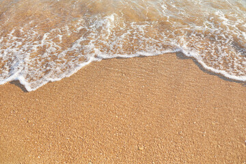 Sand top view of the sea coast or desert, texture close-up.