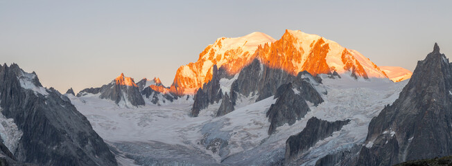 Fototapeta na wymiar The panorama of Mont Blanc massif and Aiugulles towers in the morning light.