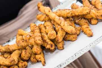 cheese stick as appetizers on a tray
