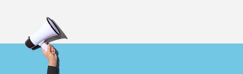 Fototapeta premium Attention and announcement concept with a megaphone