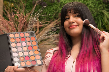 Photo of a Latina woman makeup artist