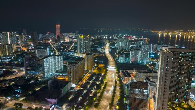 Drone shot hyperlapse car traffic move at Tun Lum Chung Eu from Jelutong to Georgetown, Penang in night