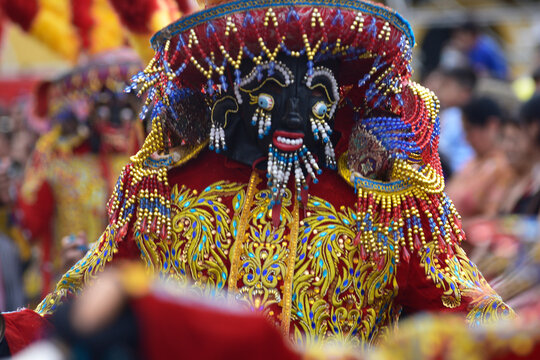 The dance of Los Negritos carnival of Hu&aacute;nuco Peru with masks dates back to colonial times when slaves arrived from Africa-October 2019,