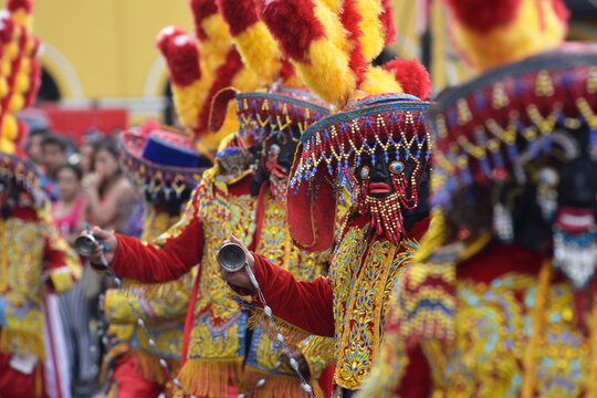 The dance of Los Negritos carnival of Hu&aacute;nuco Peru with masks dates back to colonial times when slaves arrived from Africa-October 2019,