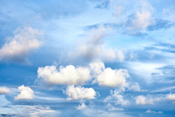 Beautiful clouds sunset light on blue sky with pink hues in asia on Bali island