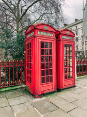 Obraz premium red telephone booths in london england
