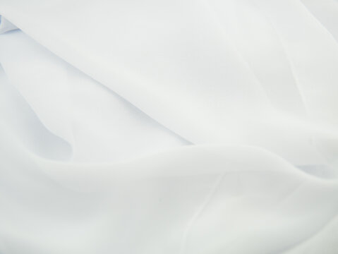 white creased fatin fabric background copy space