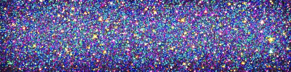 Panoramic image of polychromatic magical glitter. Full spectrum of a rainbow of colors
