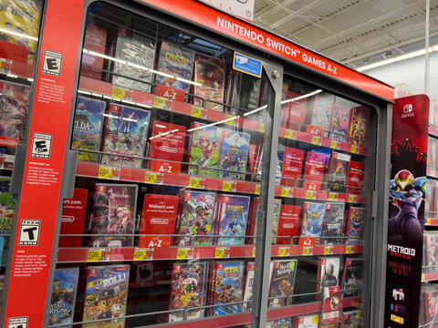 Monroe, WA USA - circa December 2022: Angled view of Nintendo Switch games for sale inside a Walmart store.