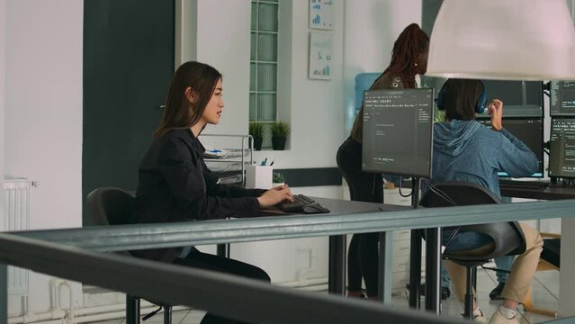 Software programer feeling stressed about writing code in front of computer, displaying artificial intelligence algorithm. Tired sad developer coding html database on terminal window.