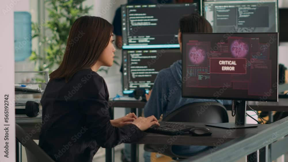 Poster diverse team of coders having server hacked and system crash, running critical error message flashin