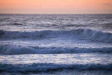 Sunrise over the Ocean Waves