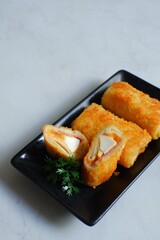 a plate of fried rissoles mayonaise