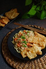 spicy noodle with fried dumpling