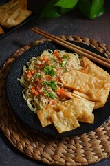 spicy noodle with fried dumpling 
