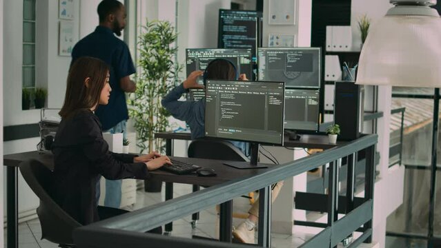 Database developer using computer to write code on terminal window, creating new web interface at desk. Coder working and parsing system algorithm in software agency office, it server.