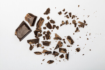 chocolate pieces isolated on white background from top view