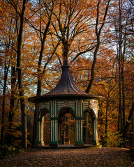 Autumnal Retreat: A Pavilion Nestled Amongst the Trees