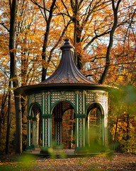 Autumnal Retreat: A Pavilion Nestled Amongst the Trees