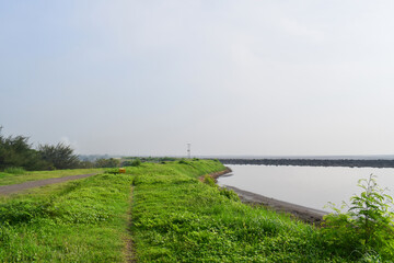 Panorama of the Sidoarjo mud or Lapindo mud is a hot mud eruption event, Sidoarjo in East Java, Indonesia that has been in eruption since May 2006.