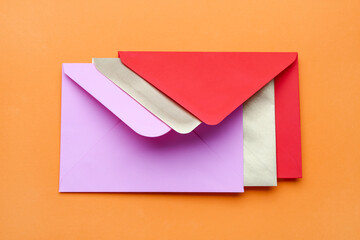 Set of envelopes on color background