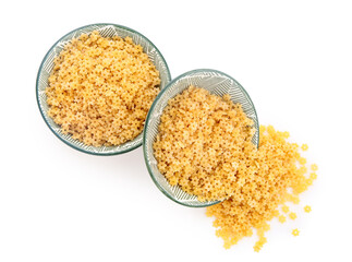 Bowls of raw stelline pasta on white background