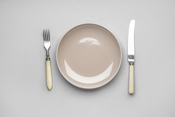 Simple table setting on grey background