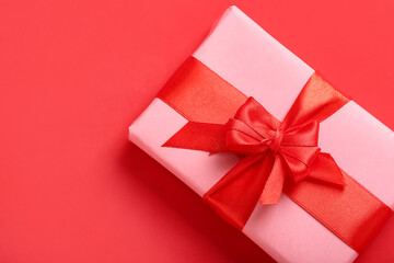 Gift for Valentine's Day celebration on red background