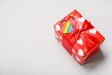 Gift for Valentine's Day on grey background. LGBT concept