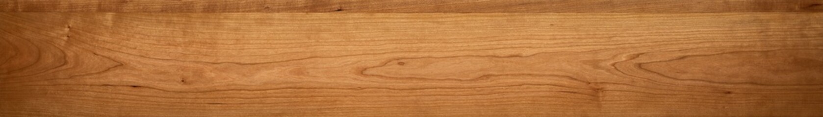 Wide textured background. Wide format cherry wood plank texture background. Wooden planks texture...
