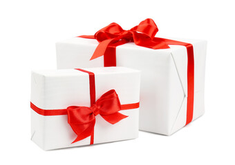 Gift boxes with beautiful bows isolated on white background. Valentine's Day celebration