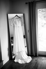 wedding dress on a window