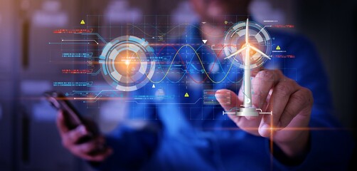 Engineer using Artificial Intelligence AI to collect data analytic for industrial management and visualizing the data through HUD Holograms display. Industrial management and future technology concept