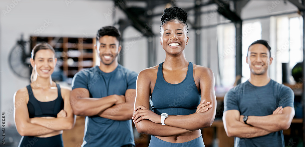 Canvas Prints Fitness, portrait and woman personal trainer with a team standing with crossed arms in the gym. Sports, collaboration and happy people after exercise, workout or training class in sport studio.