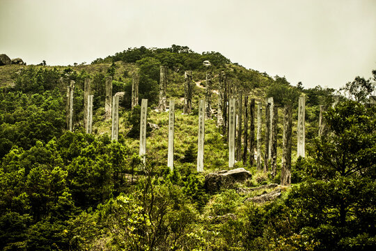 Tall stone pillars with Chinese writing.